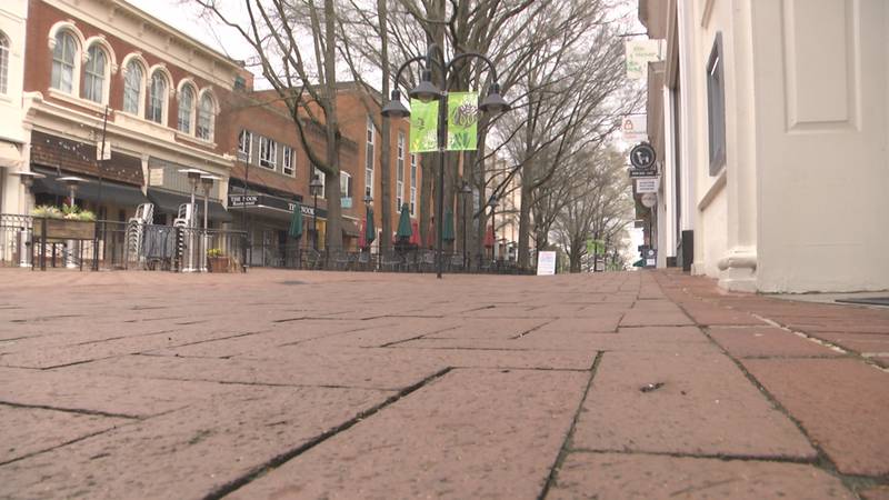 The Downtown Mall, which would be bustling as the weather gets warmer, is all but abandoned as...