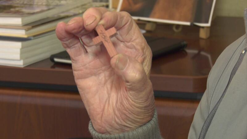 Tiny crosses carved by a 92-year-old man is brightening the days of some people in the armed...