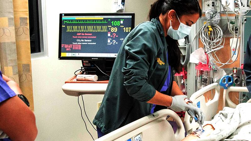 Sailors and staff assigned to Naval Medical Center San Diego's (NMCSD) Intensive Care Unit...