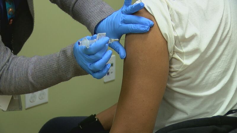 A veteran receives his shot at the Jonesboro VA Outpatient Clinic, where the Memphis VA...