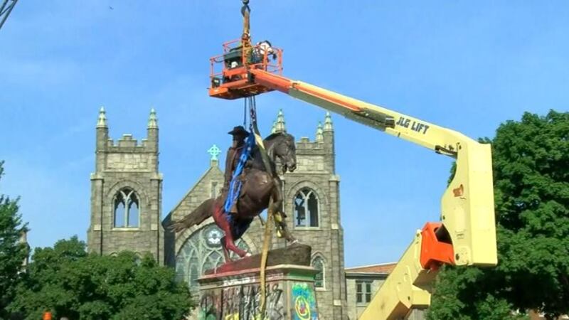 Work crews in Richmond, Virginia, have begun taking down an enormous monument to Confederate...